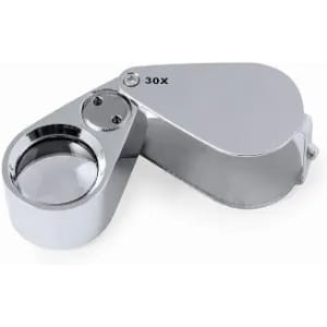 A magnifying glass in a compact, chrome finish with a 30X magnification lens. It features a sturdy hinge.