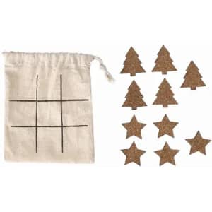 A game set featuring a drawstring bag with a grid and ten wooden stars and trees in a natural finish.
