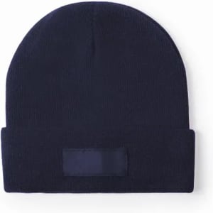 A navy blue beanie hat with a folded brim and a blank patch for branding.