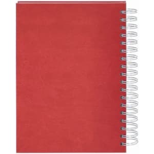 A red notebook with a spiral binding, featuring a smooth matte cover.