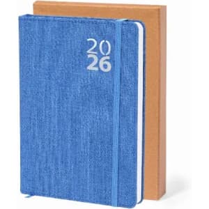 A blue planner for 2026 with a textured cover, placed next to a brown notebook. Both have elastic bands.