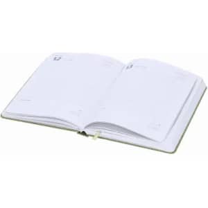 An open planner with blank pages and a green cover, featuring a ribbon bookmark.
