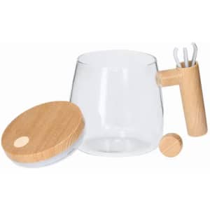 A glass container with a wooden lid and a handle, accompanied by three utensils in a wooden holder.