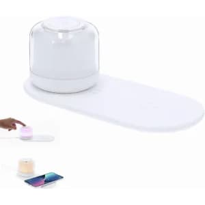 A drink bottle in white with a transparent top on a white base, featuring a logo and a touch control panel.