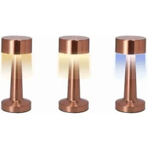 Three copper-coloured lamps with a sleek design, featuring different lighting effects in soft yellow and blue hues.