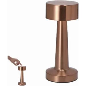 A decorative copper-coloured lamp with a sleek, modern design and a rounded base. It features a simple, minimalist shape.