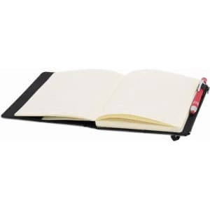 A black notebook with blank pages, open and lying flat, alongside a red pen. The notebook has a simple design.