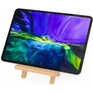 A digital tablet displaying a vibrant, abstract blue and purple design, resting on a wooden stand.