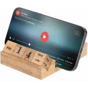 A wooden calendar stand displays the date alongside a smartphone playing a video, featuring a colourful screen.