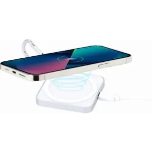 A wireless phone charger with a white base, featuring a sleek design, charging a smartphone above it.
