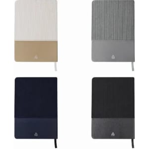 A set of four notebooks in beige, grey, navy, and black, each with a logo on the cover.