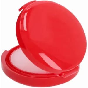 A bright red compact with a mirrored lid, featuring a smooth interior surface.