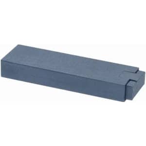 A dark blue rectangular object with a flat surface and two notches at one end, resembling a block.