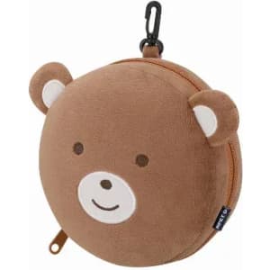 A round, brown bear-shaped pouch with a smiling face and zip closure, featuring a clip for attachment.