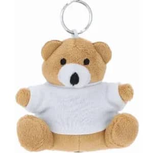 A keychain featuring a small, brown teddy bear wearing a white shirt. The bear has a round face and small limbs.