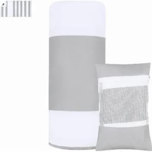 A drink bottle in grey and white, accompanied by a matching padded cushion with a mesh pocket. Both have a sleek design.