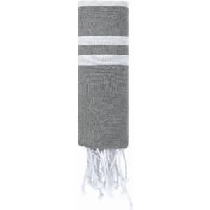 A grey and white striped towel, rolled up with fringing, featuring a simple design and soft texture.