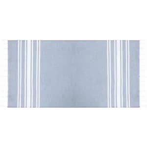 A blue and white striped towel featuring tasselled edges, neatly folded.