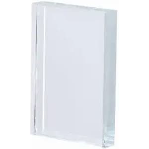 A clear acrylic block with a rectangular shape, featuring smooth edges and a polished surface.