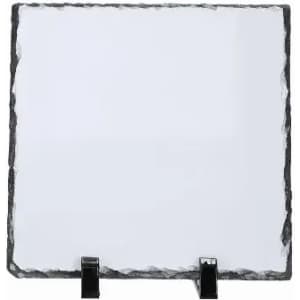 A square slate board with a jagged edge, supported by black stands. The surface is blank and smooth.