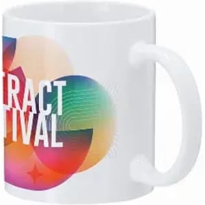 A white coffee mug featuring a vibrant, abstract design with colours in shades of pink, green, and blue.