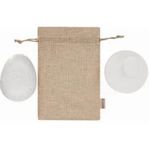 A natural fabric pouch with two smooth stones, one white and one grey, displayed on either side.
