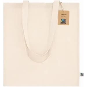 A beige canvas tote bag with two handles, featuring a tag and a logo branding on one side.