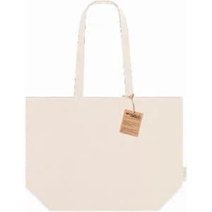 A tote bag in a light cream colour with two handles and a tag attached. It has a simple, minimalist design.