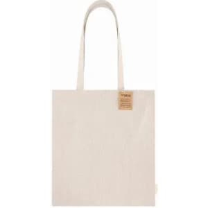 A tote bag in a natural beige colour with two handles and a small tag attached.