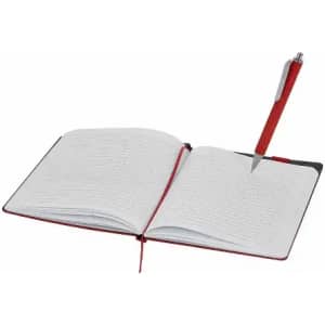 An open notebook with white pages and a red pen resting on the pages, featuring a black and red cover.