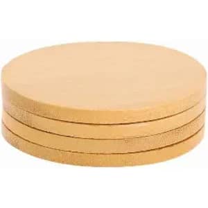 A set of four round, beige coasters stacked on top of each other. The coasters have a smooth surface and a flat design.