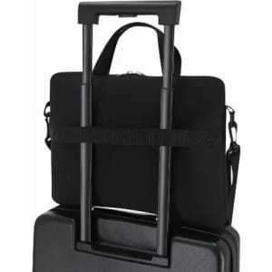 A travel bag with a black exterior resting on top of a suitcase, featuring a retractable handle and a shoulder strap.