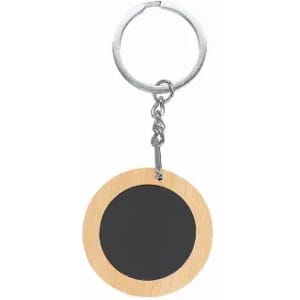 A keyring featuring a circular wooden disc with a black centre and a metal keychain attachment.