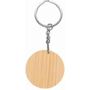 A keyring featuring a circular wooden charm with a light wood grain pattern, attached to a metal loop.