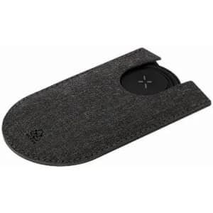 A wireless charging pad in a dark fabric sleeve, featuring a round black charging surface.
