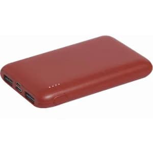 A power bank in a deep red colour with two USB ports and a charging input on one side.