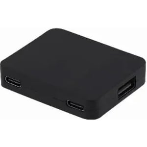 A black charging hub with multiple ports, including two USB-C and one USB-A connection. It has a smooth, rectangular design.