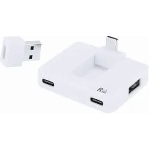 A charging hub in white with two USB-C ports and a USB adapter included. It has a compact design for easy storage.