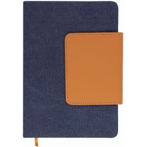 A notebook featuring a blue fabric cover with a tan leather clasp, including a ribbon marker. It has a logo on the cover.
