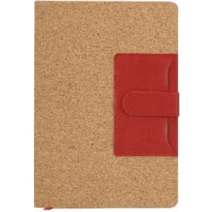 A cork-covered notebook with a red suede strap. It features a simple, natural design and a secure closure.