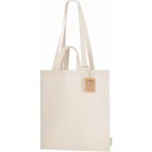 A canvas tote bag in cream colour with long handles and a tag attached. It has a simple and minimalistic design.