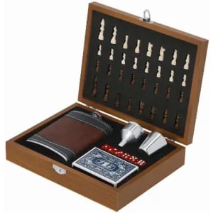 A wooden gift box containing a flask, two cups, dice, playing cards, and chess pieces.
