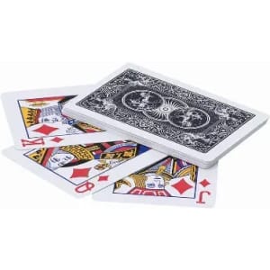 A deck of playing cards in a black design, with several face cards and a joker displayed in front.