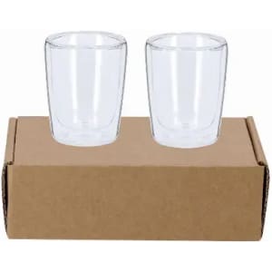A set of two clear glass tumblers displayed on a cardboard box.