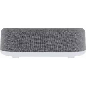 A speaker in a modern design features a grey fabric texture and a white base, with a logo on the front.