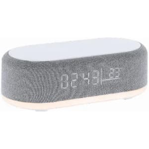 A grey oval clock radio with a fabric exterior displaying a digital time readout.