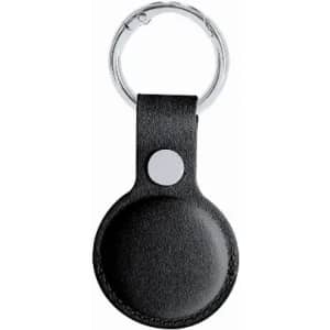 A keyring with a round, black leather holder and a metal clasp.