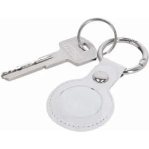 A keyring with a silver key attached, featuring a white leather tag with a metal button.