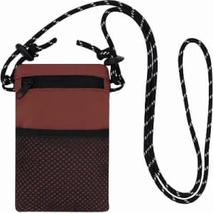 A cardholder with a maroon upper section, black mesh pocket, and a patterned strap for wearing around the neck.