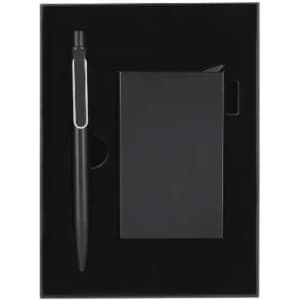 A gift set featuring a black pen and a black notebook, presented in a black box with a sleek design.